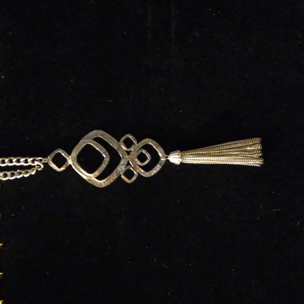 Large Boho style pendant with a 3" chain tassel. The Silverstone chain is 28+2"